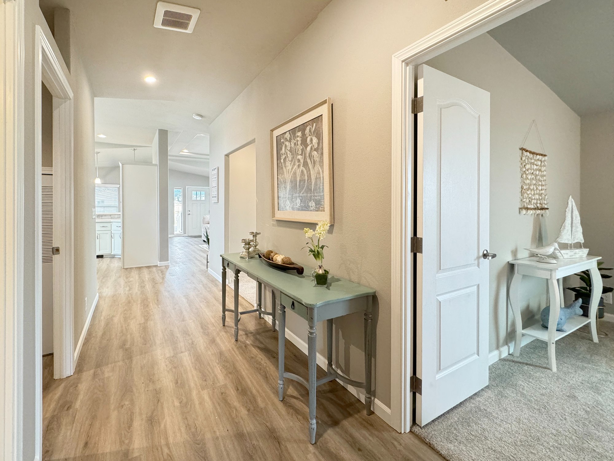 bright interior hallway with wood look flooring at lavender meadows in sequim wa
