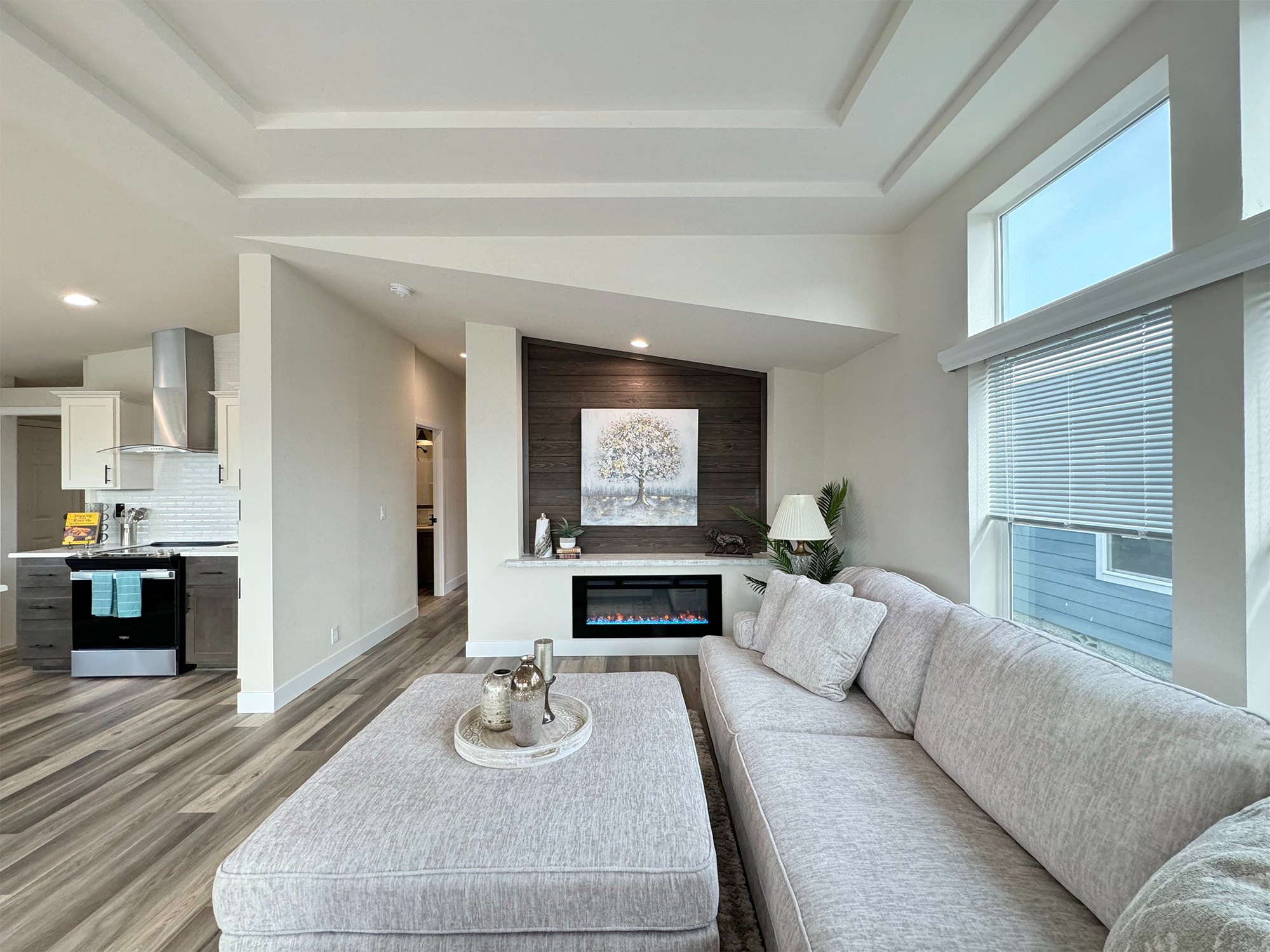 chic living room with wood accent fireplace at lavender meadows in sequim wa