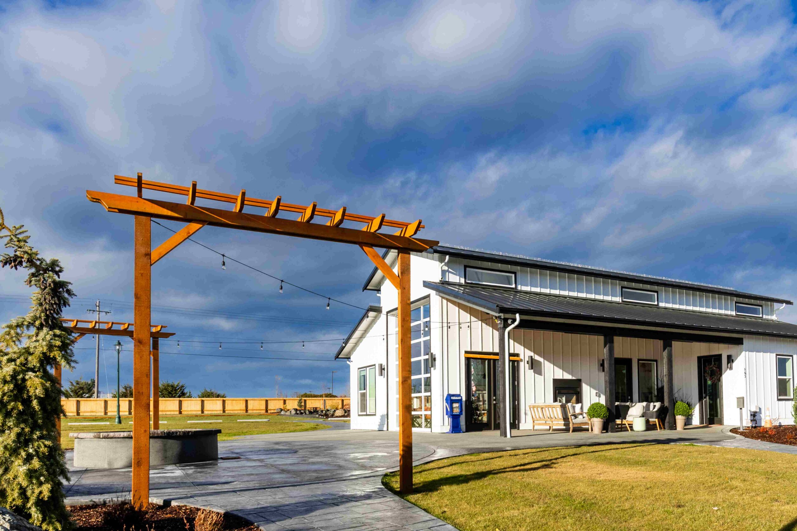Clubhouse exterior and firepit area at Lavender Meadows