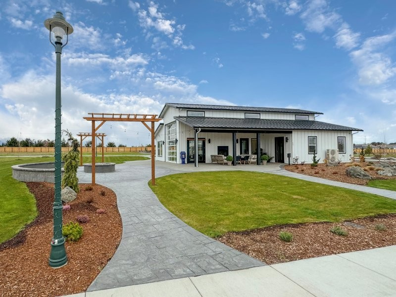 polished clubhouse exterior and stamped concrete path at lavender meadows in sequim wa