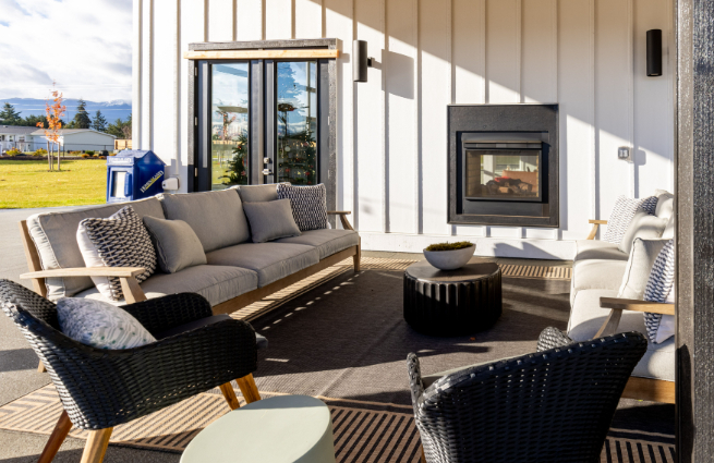 relaxing outdoor lounge with built in fireplace at lavender meadows in sequim wa