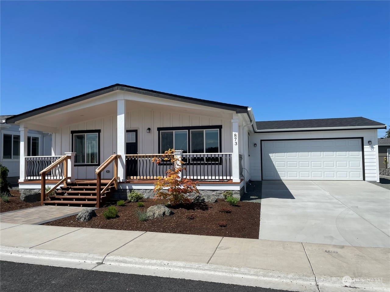 single story manufactured home with site built garage at lavender meadows in sequim wa