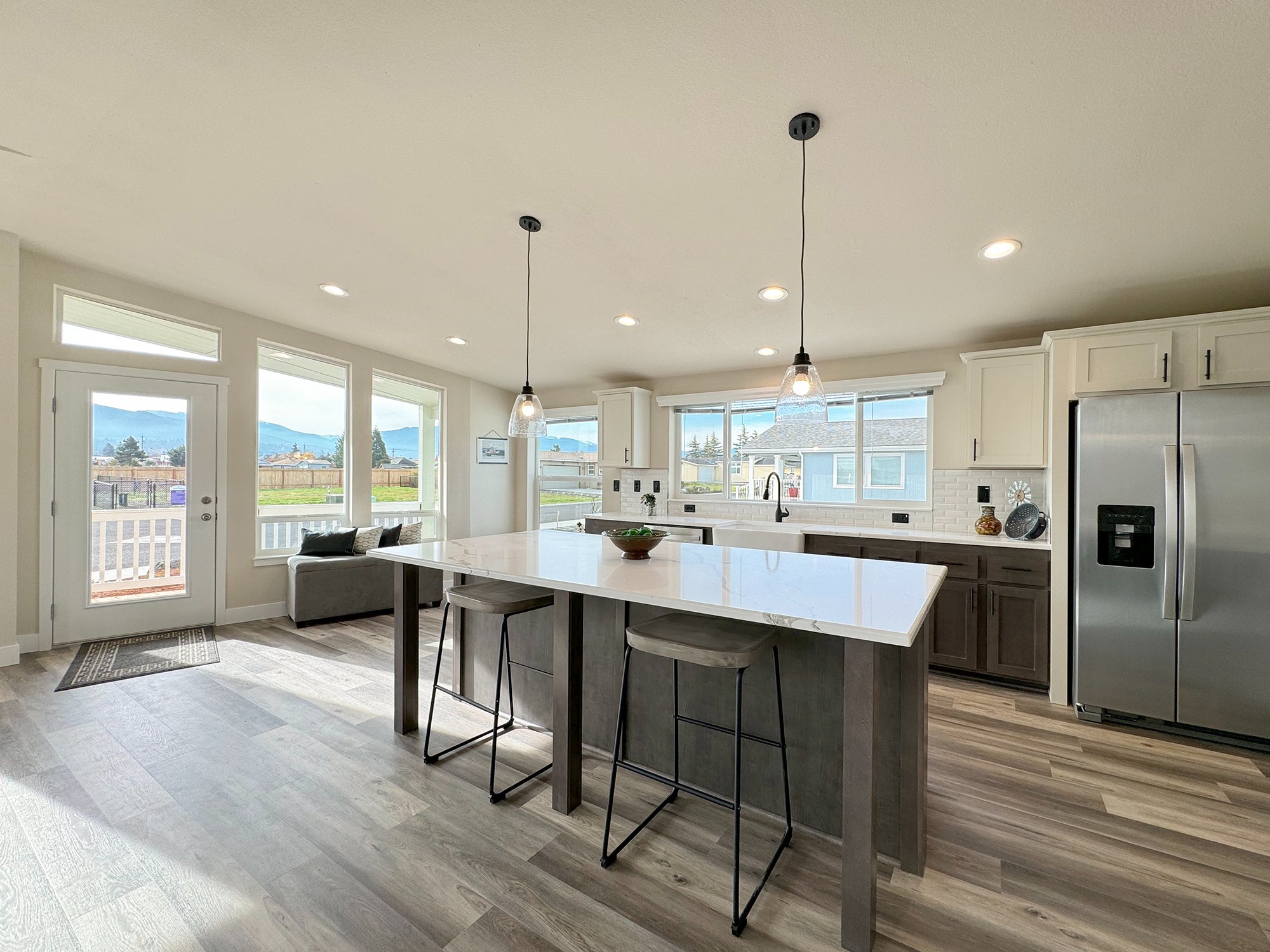 sleek kitchen with oversized island at lavender meadows in sequim wa