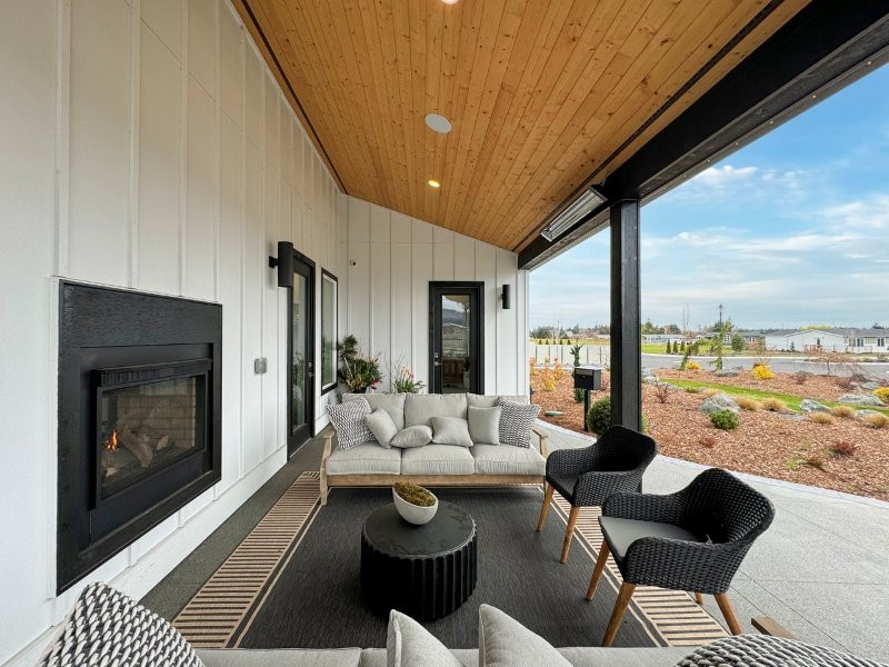spacious covered patio with built in fireplace at lavender meadows in sequim wa