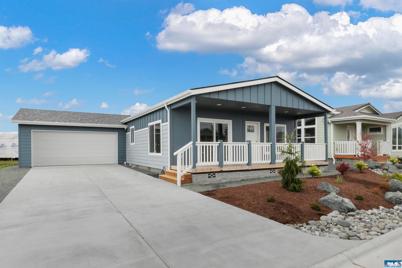 striking blue and gray exterior with site built garage at lavender meadows in sequim wa