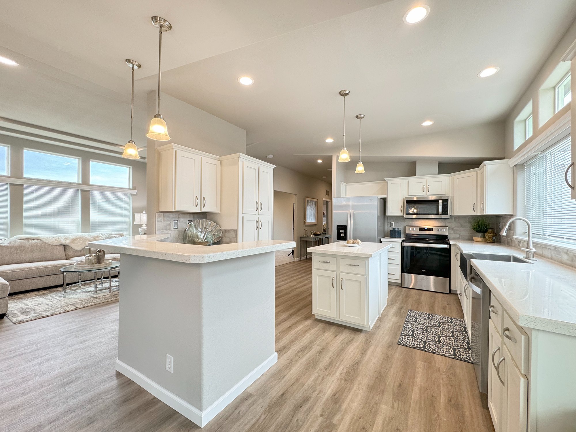 updated kitchen with crisp white cabinetry at lavender meadows in sequim wa