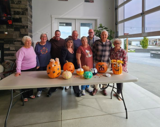 Halloween pumpkin decorating event for Lavender Meadows MHC residents